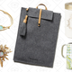 Nicola Cuff, $27 | Opalescent Sunburst Ring, $34 | Felt & Leather Tech Case, $34 | Boulangerie Jar, $13 | Pome Mug, $10